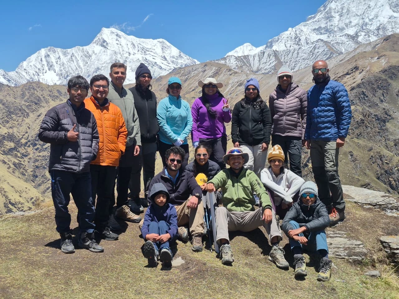 Group travel moment near a scenic campsite